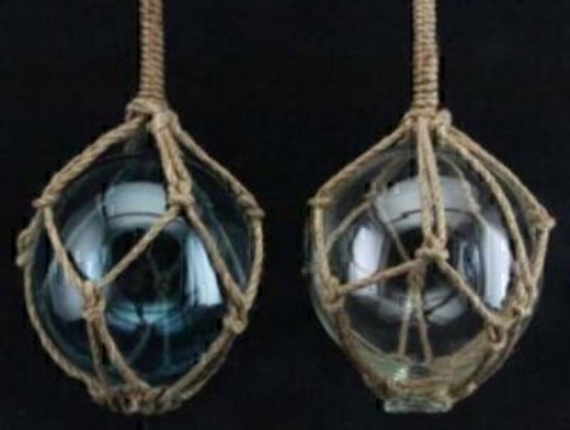 Blue or Clear Glass Decorative Fishing Floats in twine net by Gisela Graham. If preference please specify colour when ordering. These decorative fishing floats by the designer Gisela Graham would make a great addition to a beach or sea themed room or ba